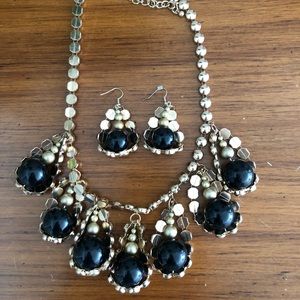 Black and gold necklace and earrings